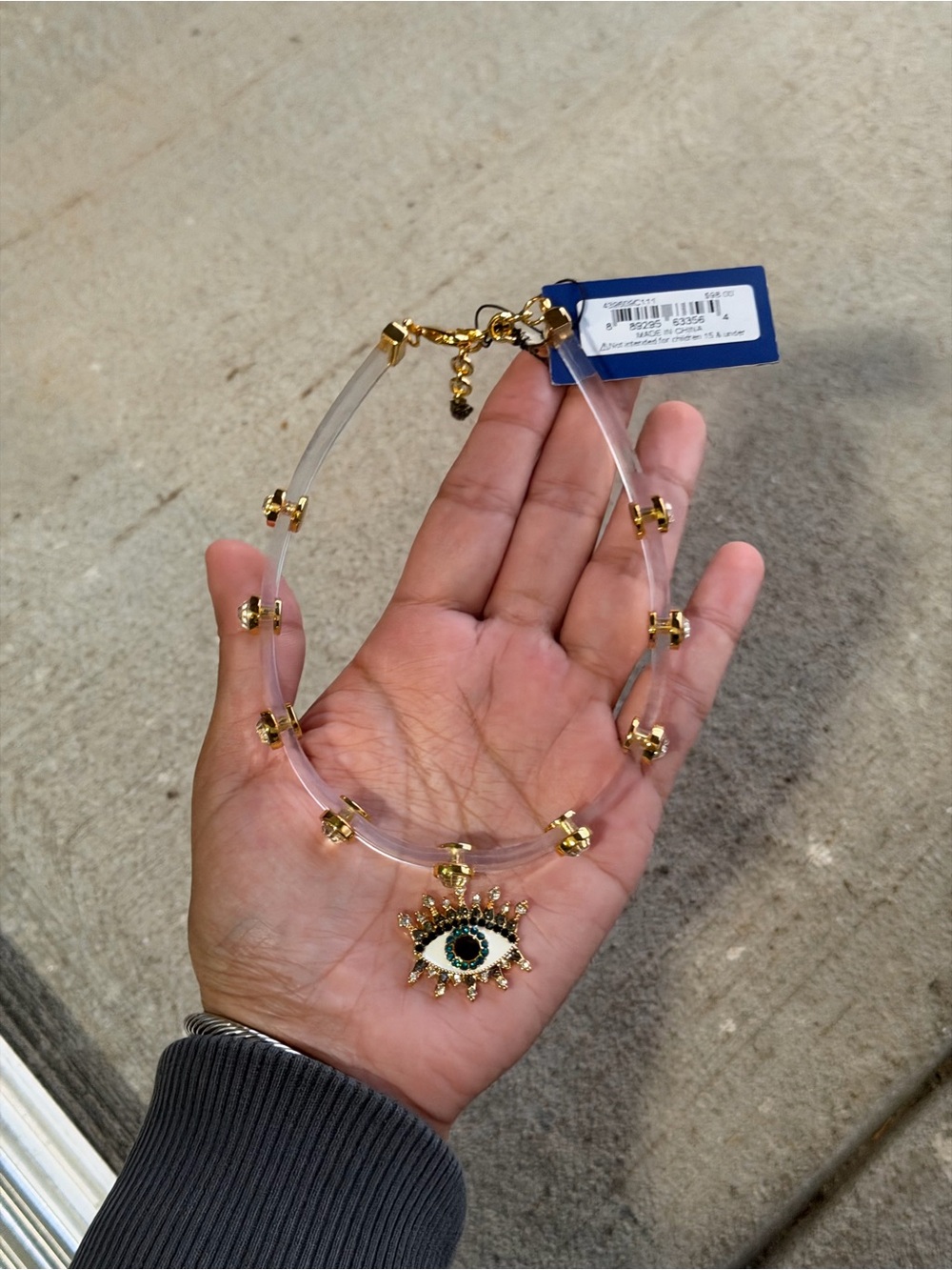 Kurt Geiger Clear Necklace with Gold Accents and Evil Eye Pendant